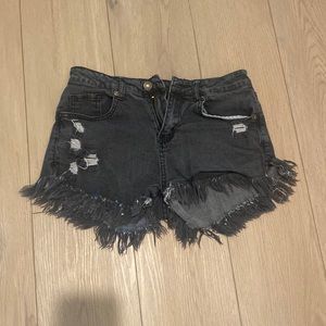 Black distressed shorts